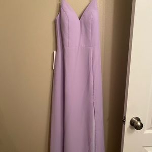 Lilac dress. Bought wrong color for a wedding. Never worn. Cannot return